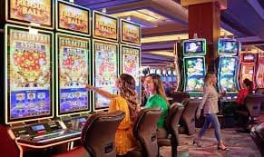 Variety of slot game titles displayed on mobile screen